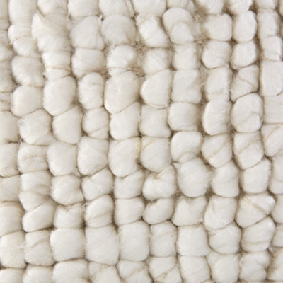 Ashley Furniture Aavie Pillow in soft, textured fabric with a stylish design, perfect for adding comfort and decor to your space.