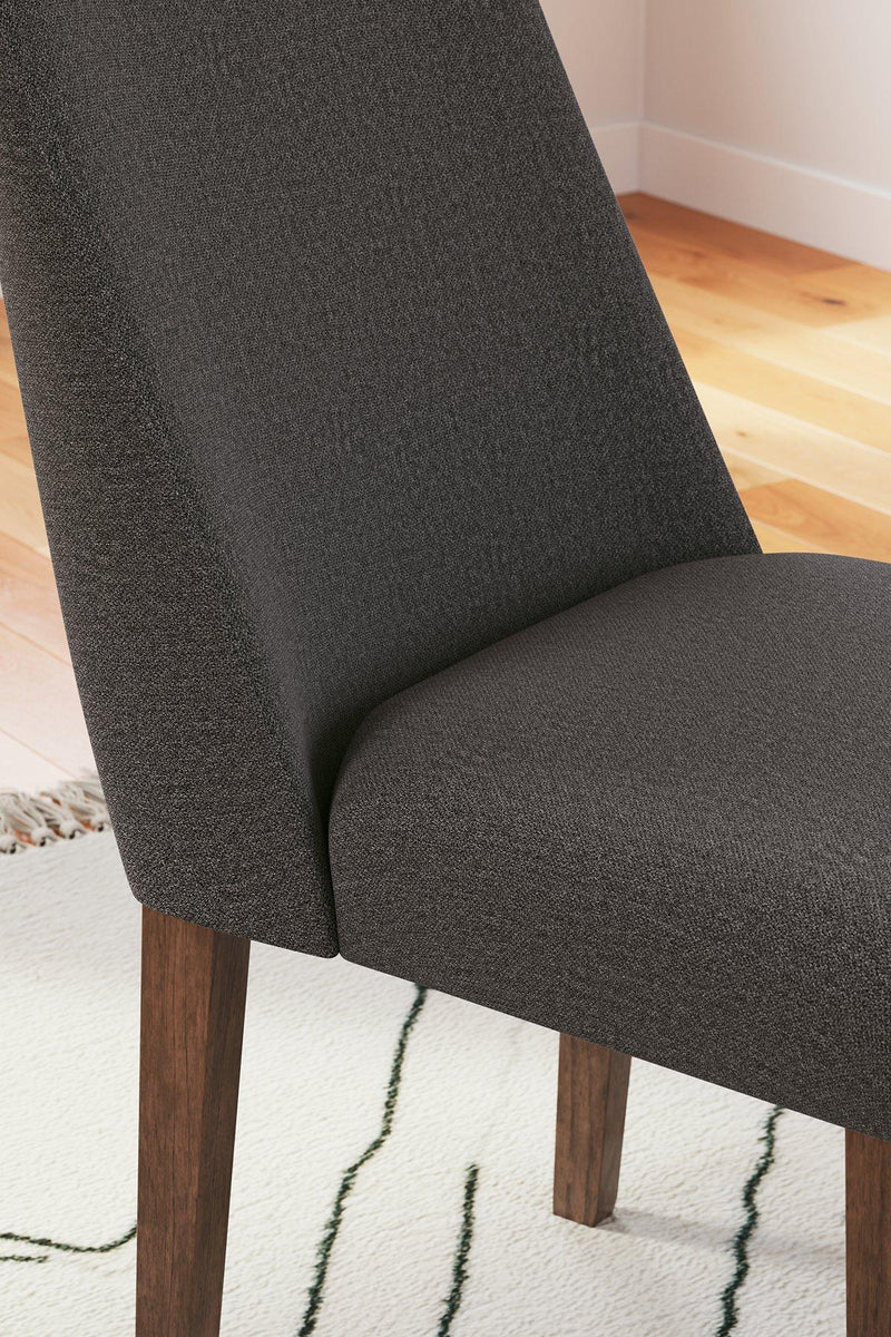 Ashley Furniture Lyncott dining room set with a wooden table and matching chairs, elegant and modern kitchen furniture.