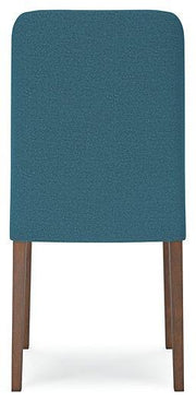 Ashley Furniture Lyncott dining room set with a wooden table and matching chairs in a modern dining space.
