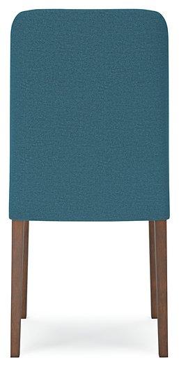 Ashley Furniture Lyncott dining room set with a wooden table and matching chairs in a modern dining space.