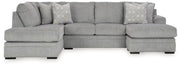 Ashley Casselbury Living Room Set featuring a sofa, loveseat, and armchair with neutral fabric and wooden legs in a modern style.
