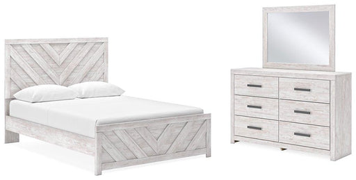 Ashley Furniture Cayboni bedroom set featuring a modern bed frame, matching nightstands, and a stylish dresser in a cozy bedroom.