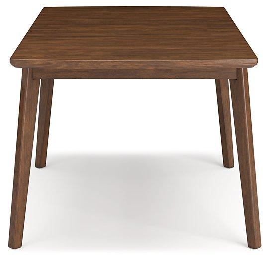 Ashley Furniture Lyncott dining room set featuring a wooden table and matching chairs in a modern dining space.
