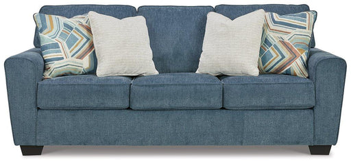 Ashley Furniture Cashton Sofa with plush fabric and modern design, shown in a stylish living room setting.