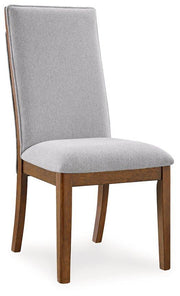 Ashley Furniture Lyncott dining room set with a wooden table and matching chairs in a modern dining space