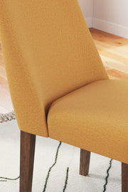 Ashley Furniture Lyncott dining room set with a wooden table and matching chairs in a modern dining space.