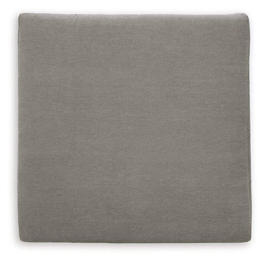 Ashley Furniture Avaliyah oversized accent ottoman with plush fabric and a sturdy wooden base, perfect for living room decor.