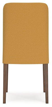 Ashley Furniture Lyncott dining room set with a wooden table and matching chairs in a modern dining space.