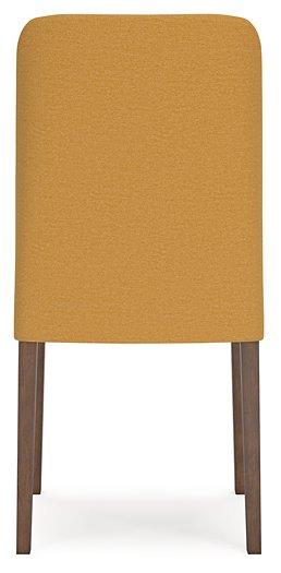 Ashley Furniture Lyncott dining room set with a wooden table and matching chairs in a modern dining space.