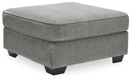 Ashley Furniture Altari oversized accent ottoman with plush fabric, modern design, and sturdy wooden legs in a neutral color.