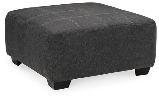 Ashley Furniture Ambee oversized accent ottoman with plush fabric and contemporary design, shown as a versatile living room piece.