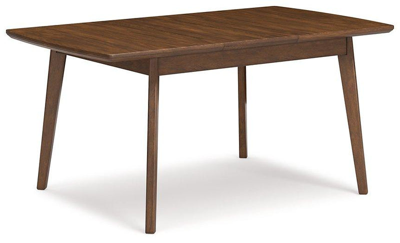 Ashley Furniture Lyncott dining room set with a wooden table and upholstered chairs in a modern dining space.