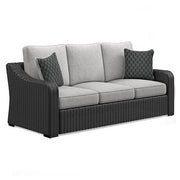 Ashley Furniture Beachcroft outdoor sofa with plush cushions, weather-resistant wicker seating for patio or garden relaxation.