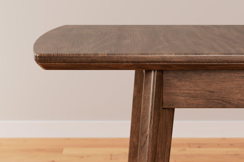 Ashley Furniture Lyncott dining room set with a rectangular table and six upholstered chairs in a modern dining space.