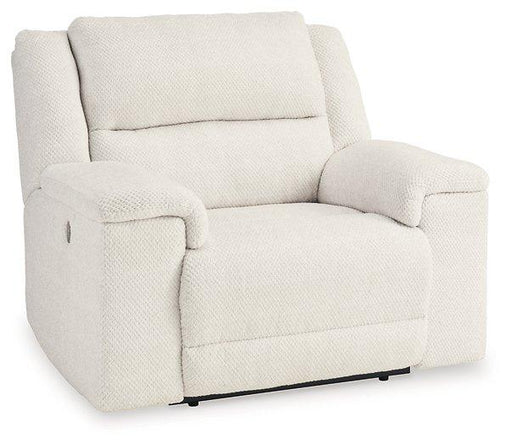 Ashley Furniture Keensburg oversized power recliner with plush cushioning and dark upholstery, showing the relaxed reclined position.