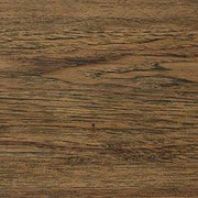 Ashley Furniture Cabalynn dining extension table showing a wooden surface with extended leaves and modern design.