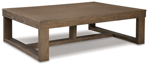 Ashley Furniture Cariton coffee table, modern cocktail table with wooden finish, showcasing a sleek design and sturdy construction.
