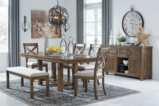 Ashley Furniture Moriville dining room set with a wooden table and six matching chairs in a modern dining area.