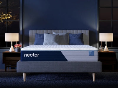 Nectar 5.1 Hybrid Classic mattress with a quilted top and supportive layers, shown on a bed with neutral bedding.
